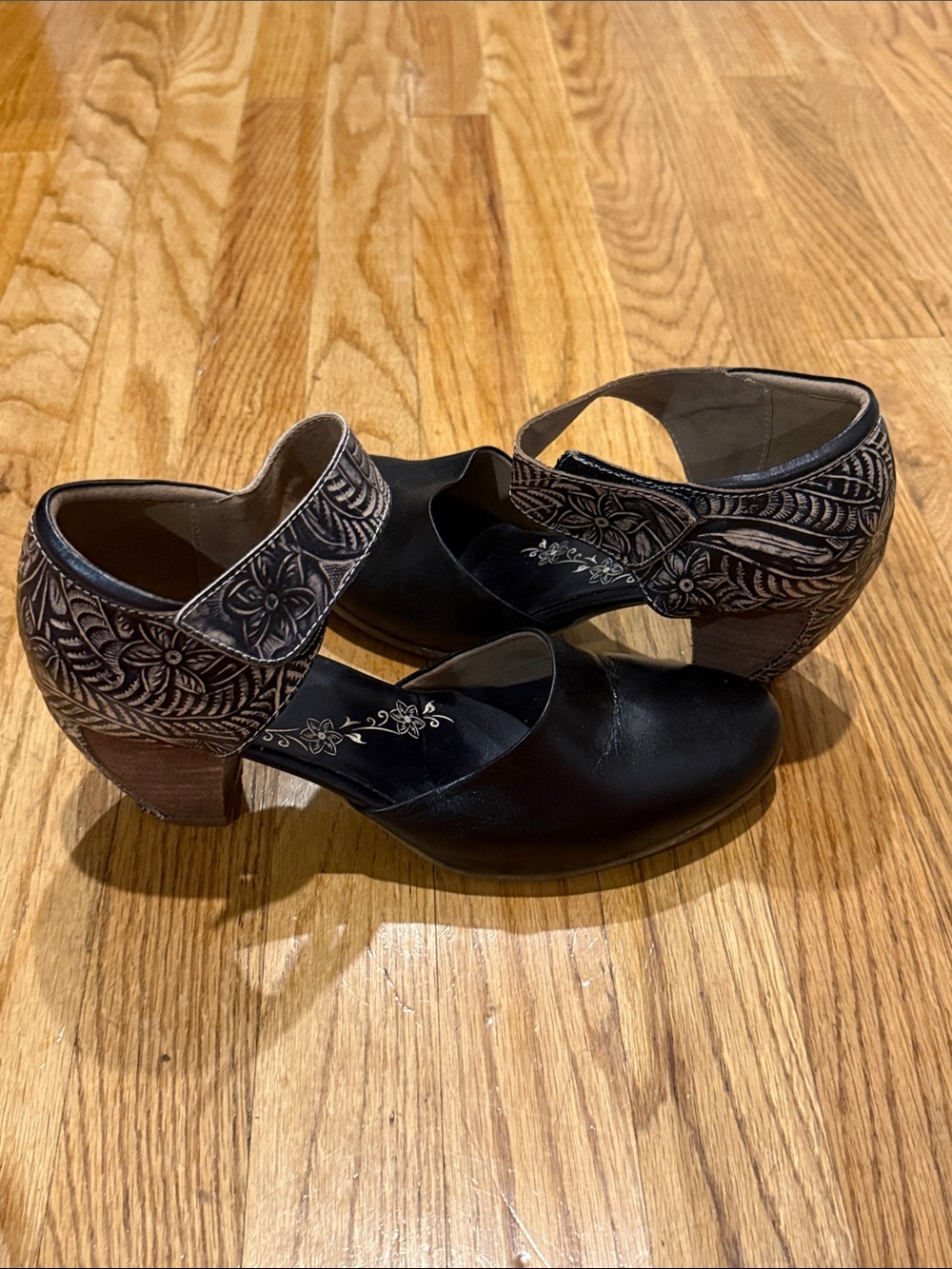 L'ATISTE Black Mary Jane Heels with Floral-Engraved Ankle Strap